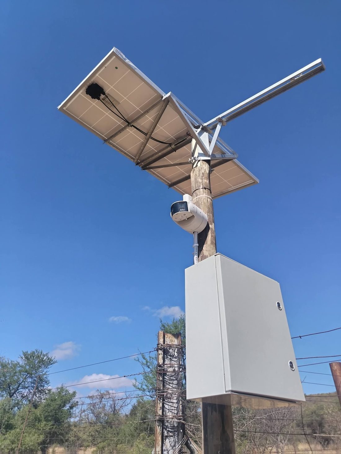 Solar-powered panoramic camera on farm boundary